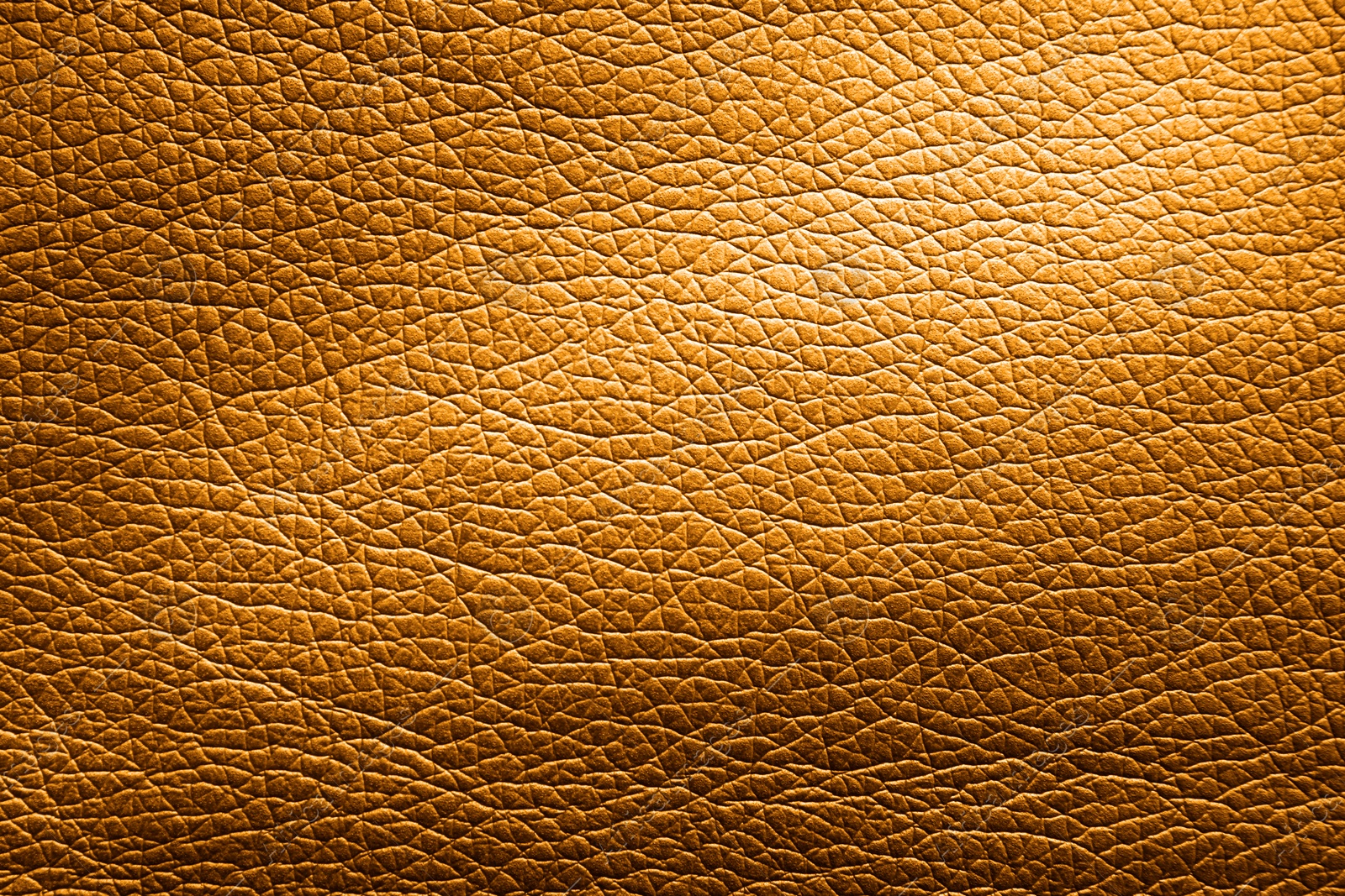 Image of Golden textured surface as background, closeup view