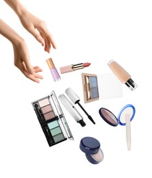 Woman and levitating decorative cosmetics on white background, closeup. Makeup products