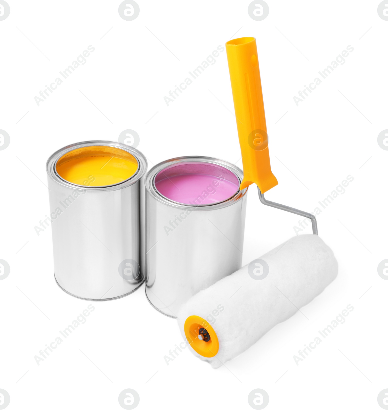 Photo of Cans with different paints and roller on white background