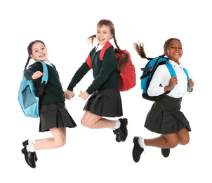 Image of Children in school uniform jumping on white background