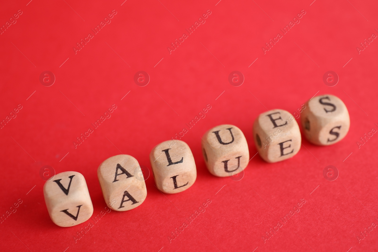 Photo of Beads with word VALUES on red background