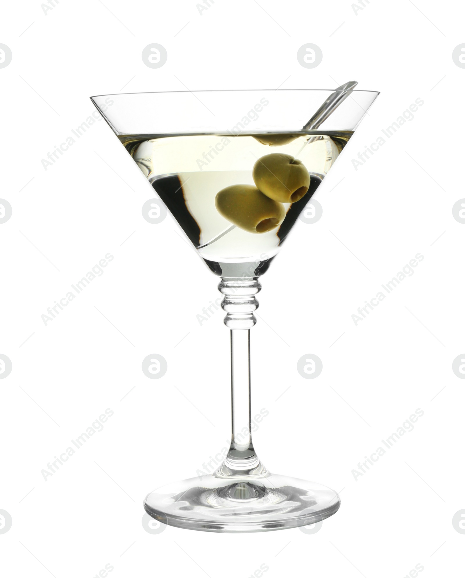 Photo of Glass of classic martini cocktail with olives on white background