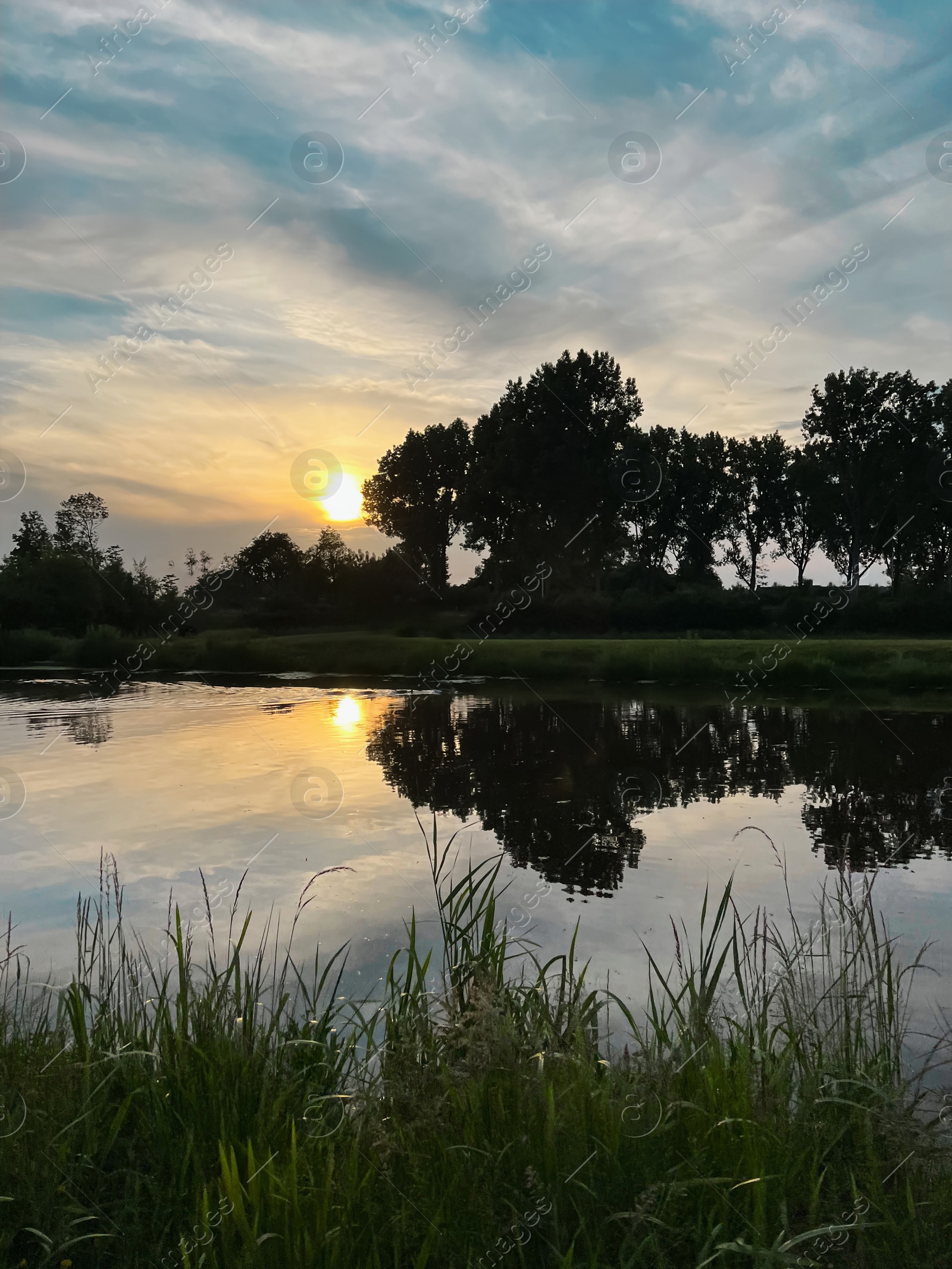 Photo of Beautiful view of lake during sunset. Picturesque landscape