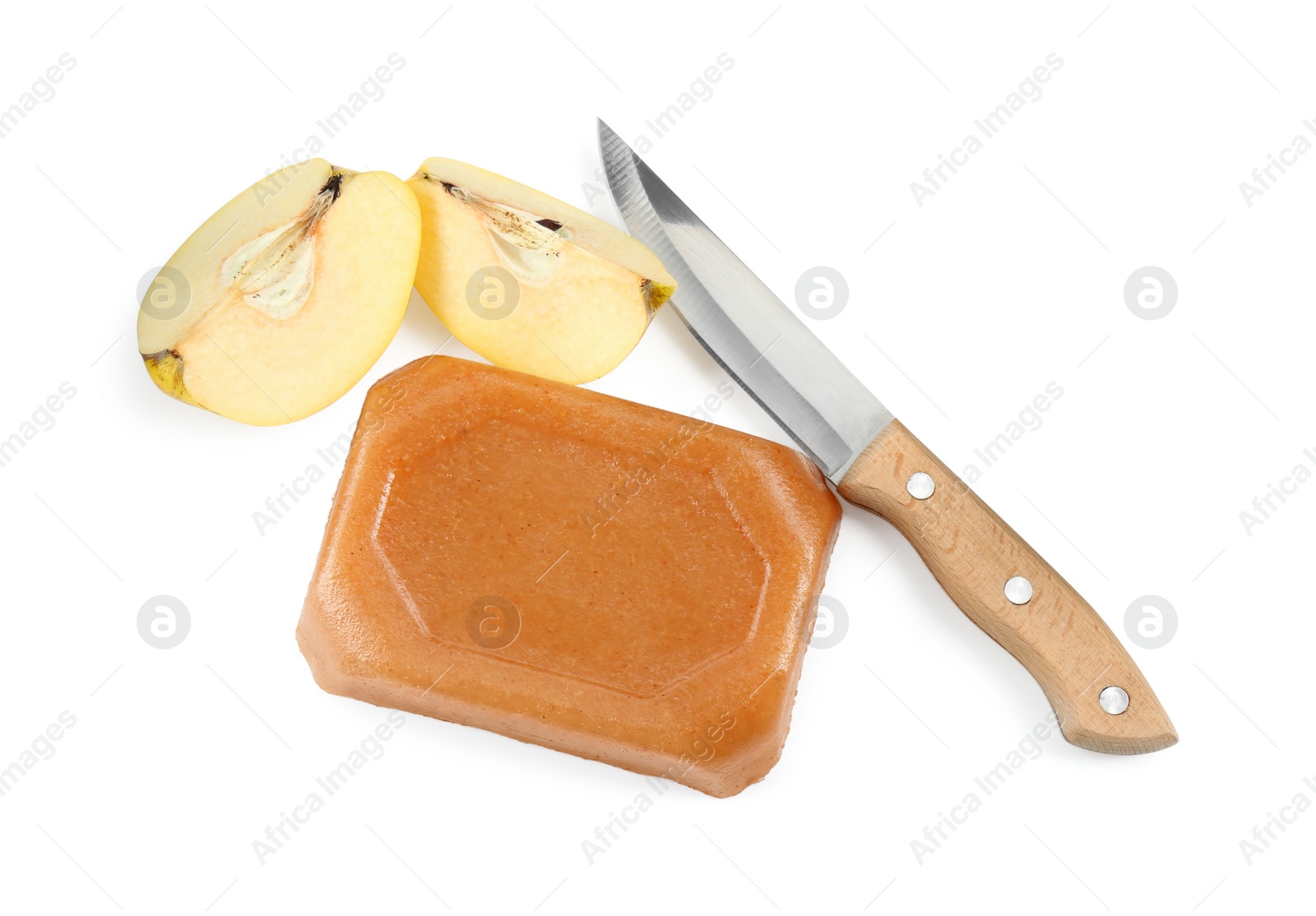 Photo of Delicious sweet quince paste, knife and fresh cut fruit isolated on white, top view