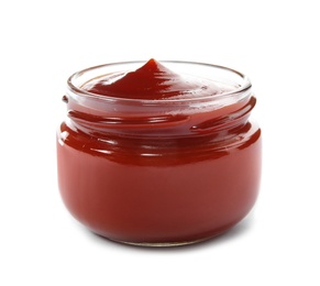 Photo of Tasty homemade tomato sauce in glass jar on white background