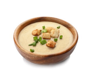 Bowl of fresh homemade mushroom soup on white background