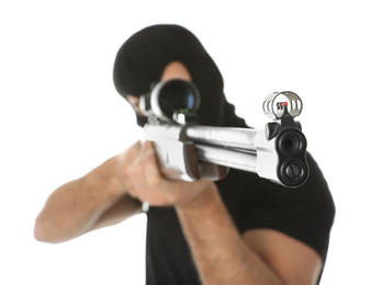 Professional killer with sniper rifle on white background