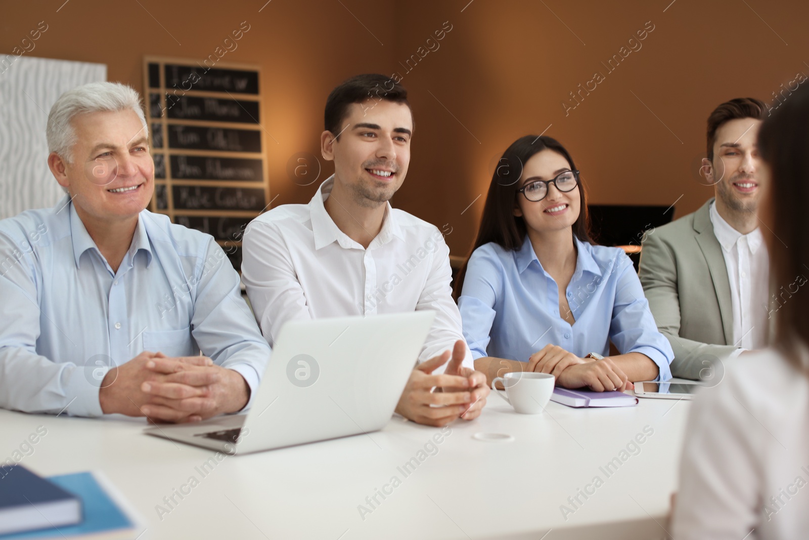 Photo of Human resources commission conducting job interview with applicant in office