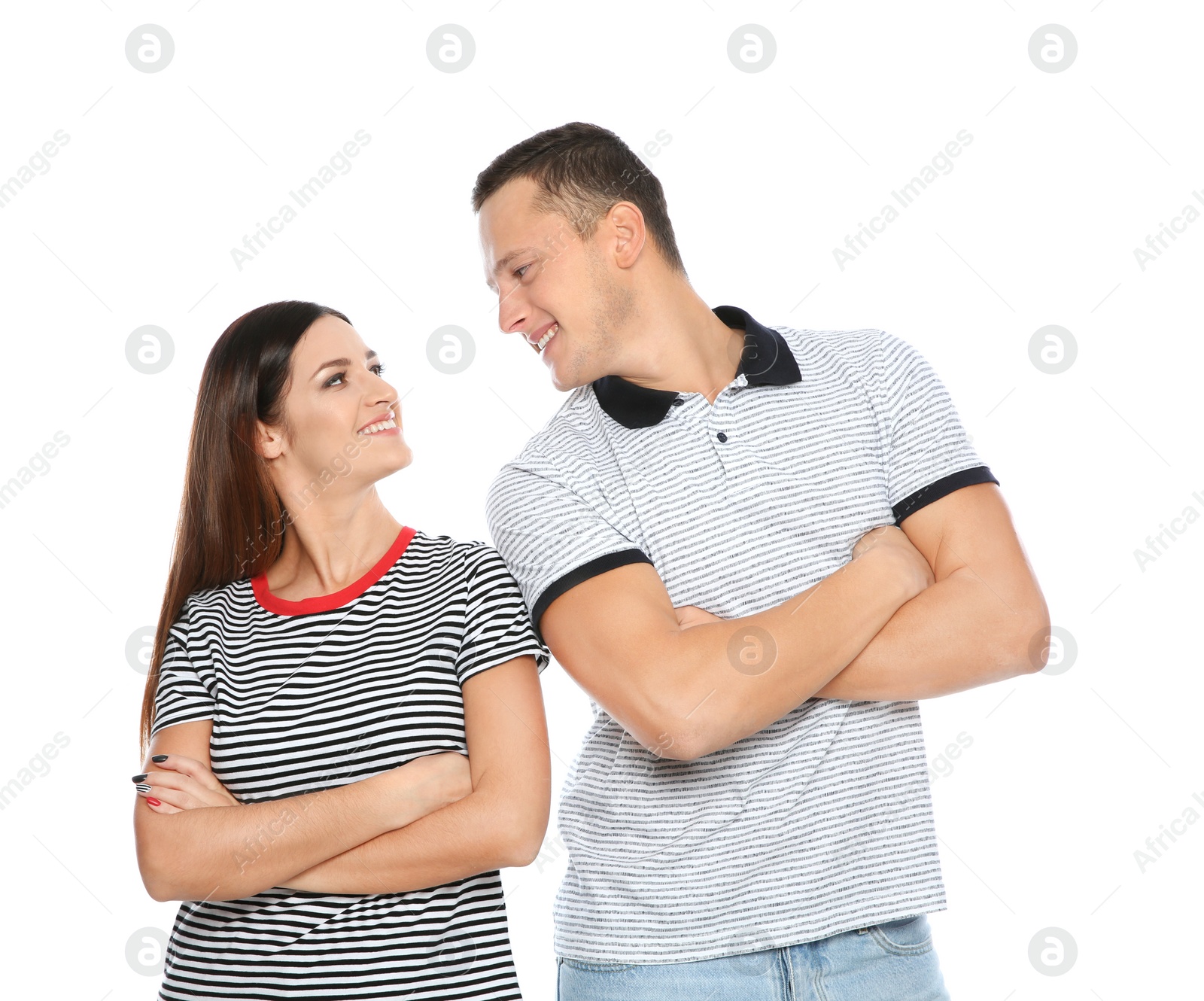 Photo of Portrait of cute young couple on white background