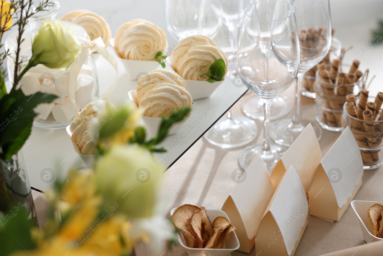 Photo of Tasty treats on table in room. Sweet buffet