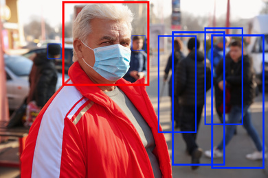 Image of Senior man with medical mask and scanner frame on city street. Machine learning
