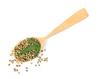 Photo of Spoon with hemp seeds and green leaf on white background, top view