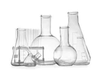 Photo of Set of empty laboratory glassware on white background