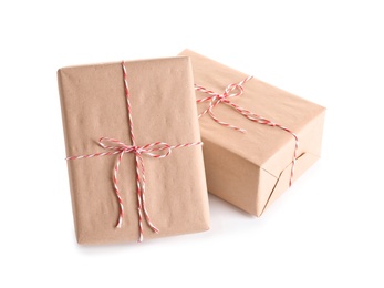 Photo of Beautifully wrapped gift boxes on white background