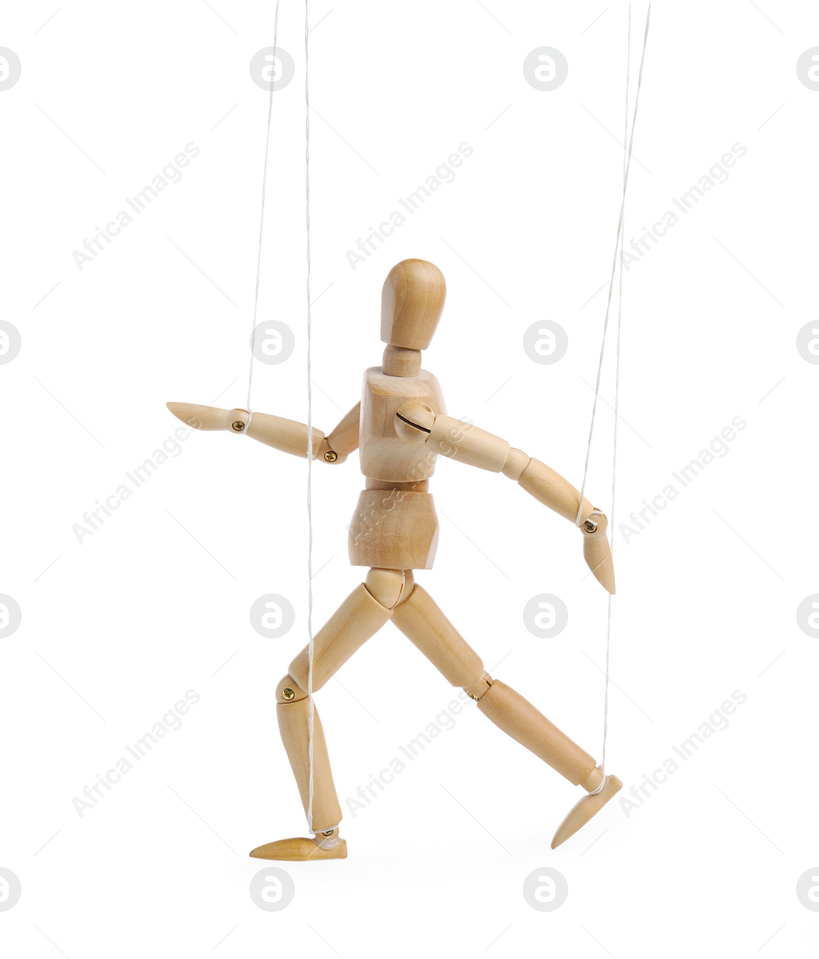 Photo of One wooden puppet with strings on white background