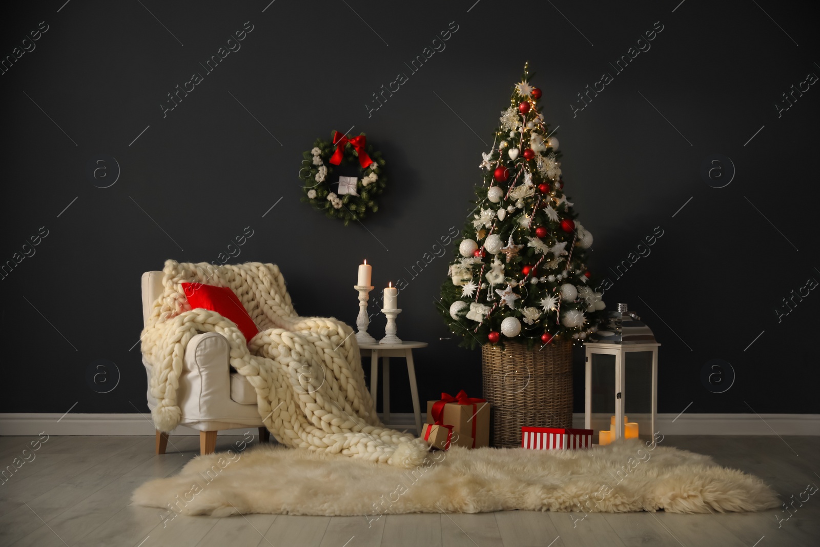 Photo of Beautiful Christmas themed photo zone. Cozy living room interior imitation