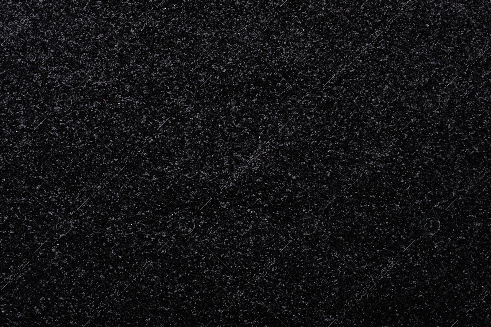 Photo of Beautiful shiny black glitter as background, closeup