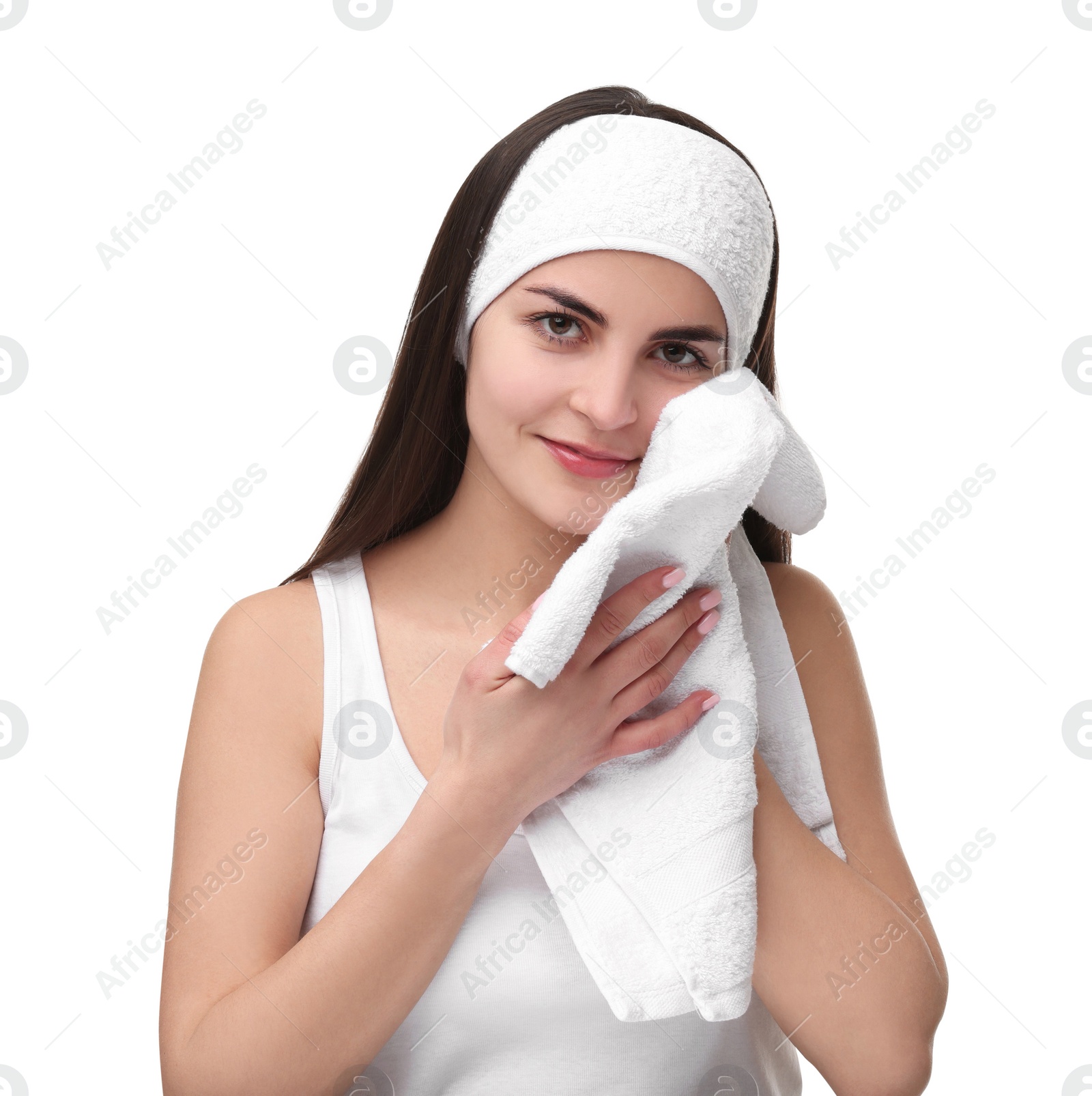 Photo of Washing face. Young woman with headband and towel on white background