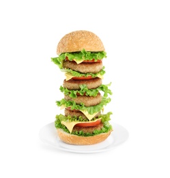 Tasty huge burger with cheese on white background