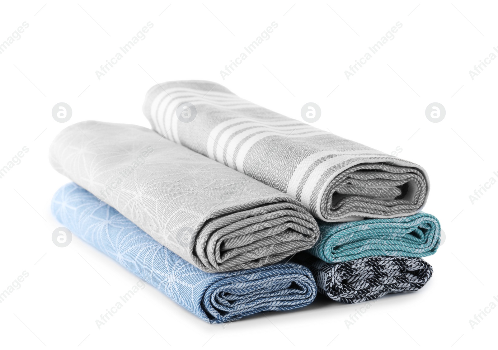 Photo of Rolled clean kitchen towels isolated on white