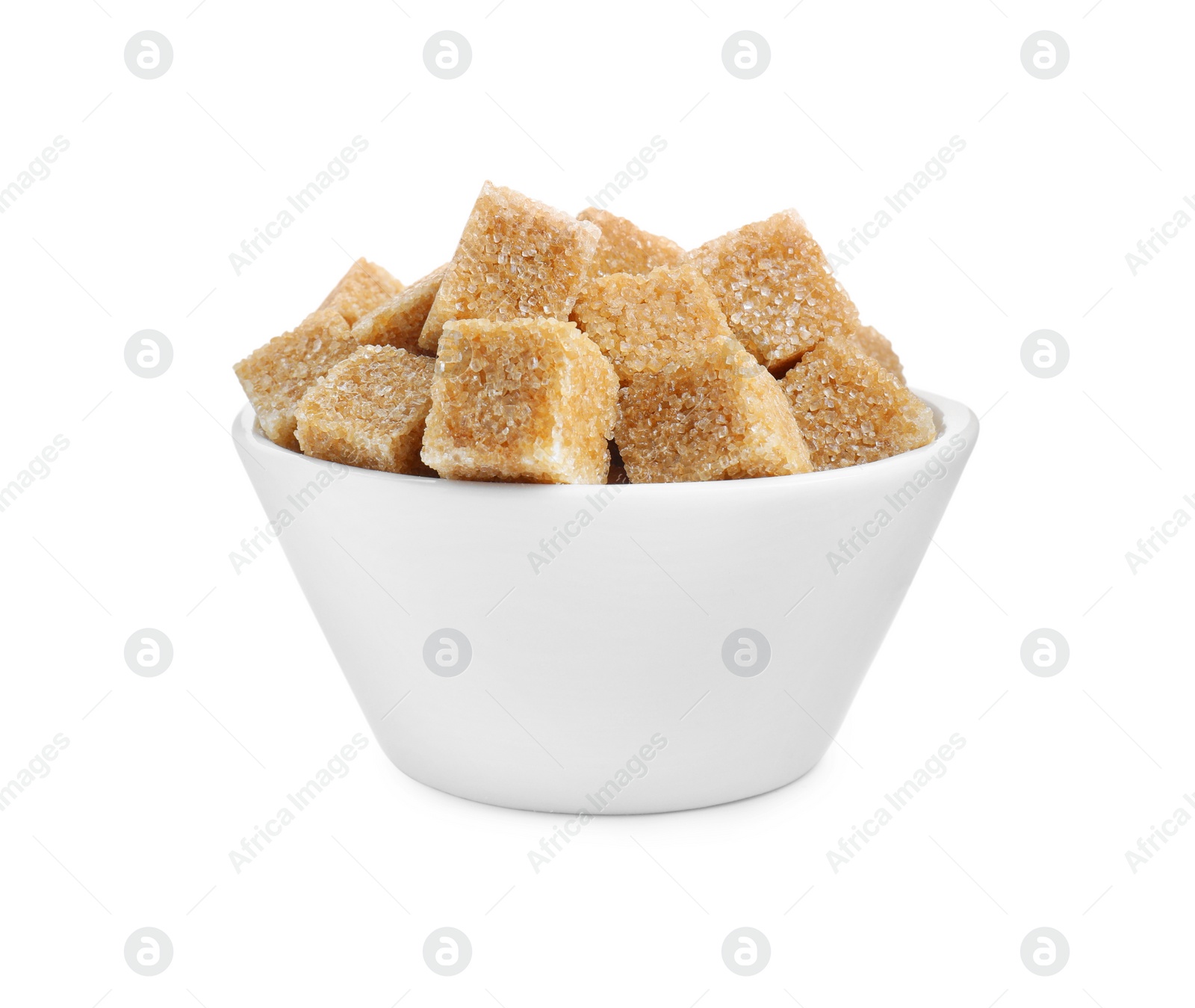 Photo of Brown sugar cubes in bowl isolated on white