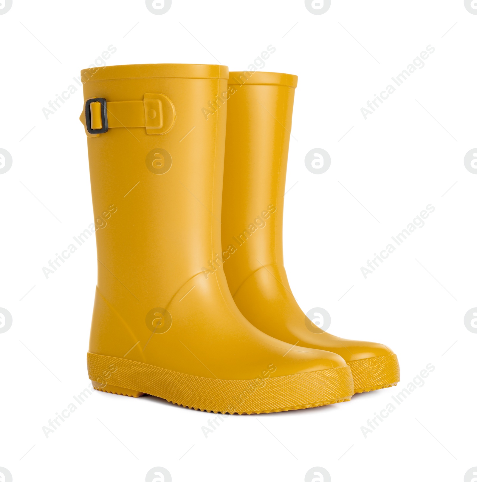 Photo of Modern yellow rubber boots isolated on white