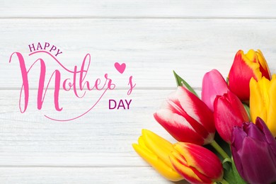 Happy Mother's Day. Beautiful tulips on white wooden background, flat lay