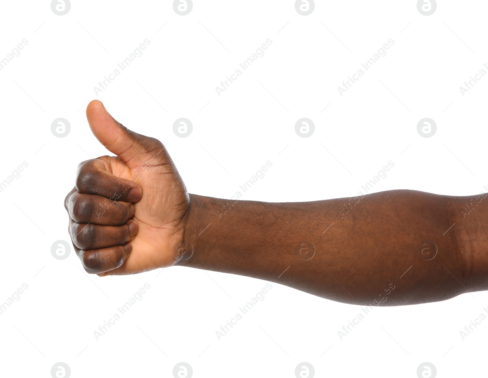 Photo of African-American man showing thumb up gesture on white background, closeup