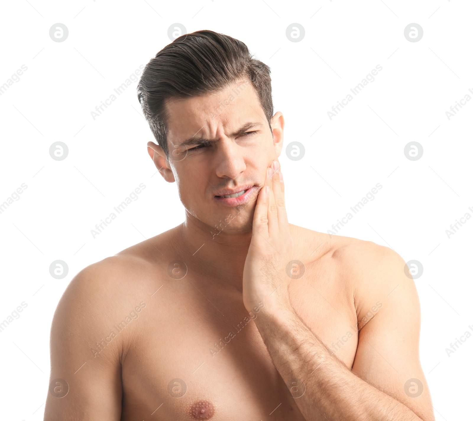 Photo of Young man suffering from toothache on white background