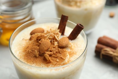 Delicious rice pudding with almonds and cinnamon, closeup