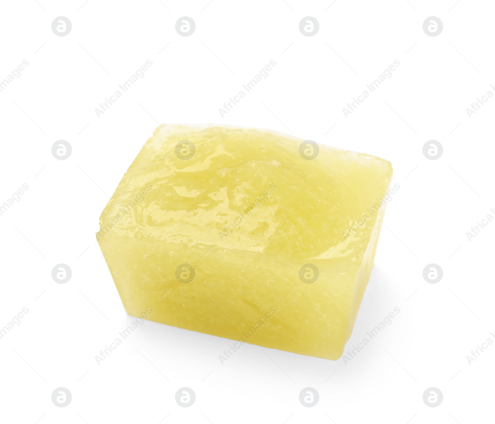 Photo of Frozen zucchini puree cube isolated on white