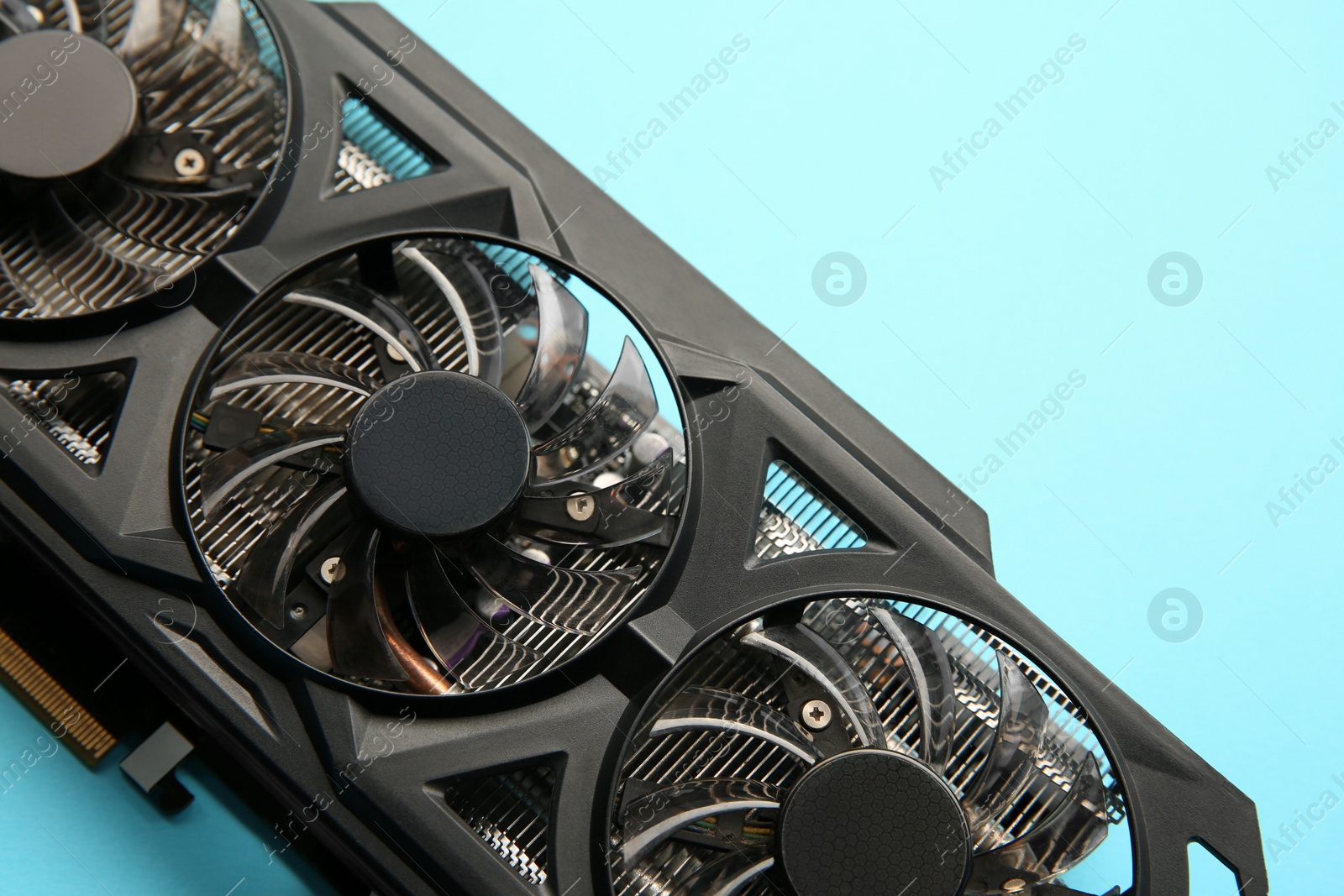 Photo of One graphics card on light blue background