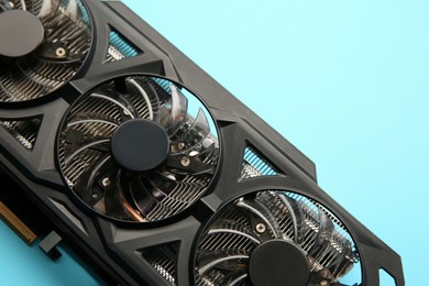 Photo of One graphics card on light blue background