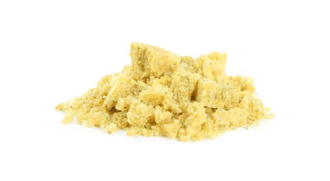 Aromatic crumbled bouillon cube on white background