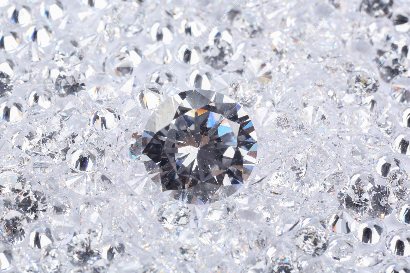 Photo of Many beautiful shiny diamonds as background, closeup