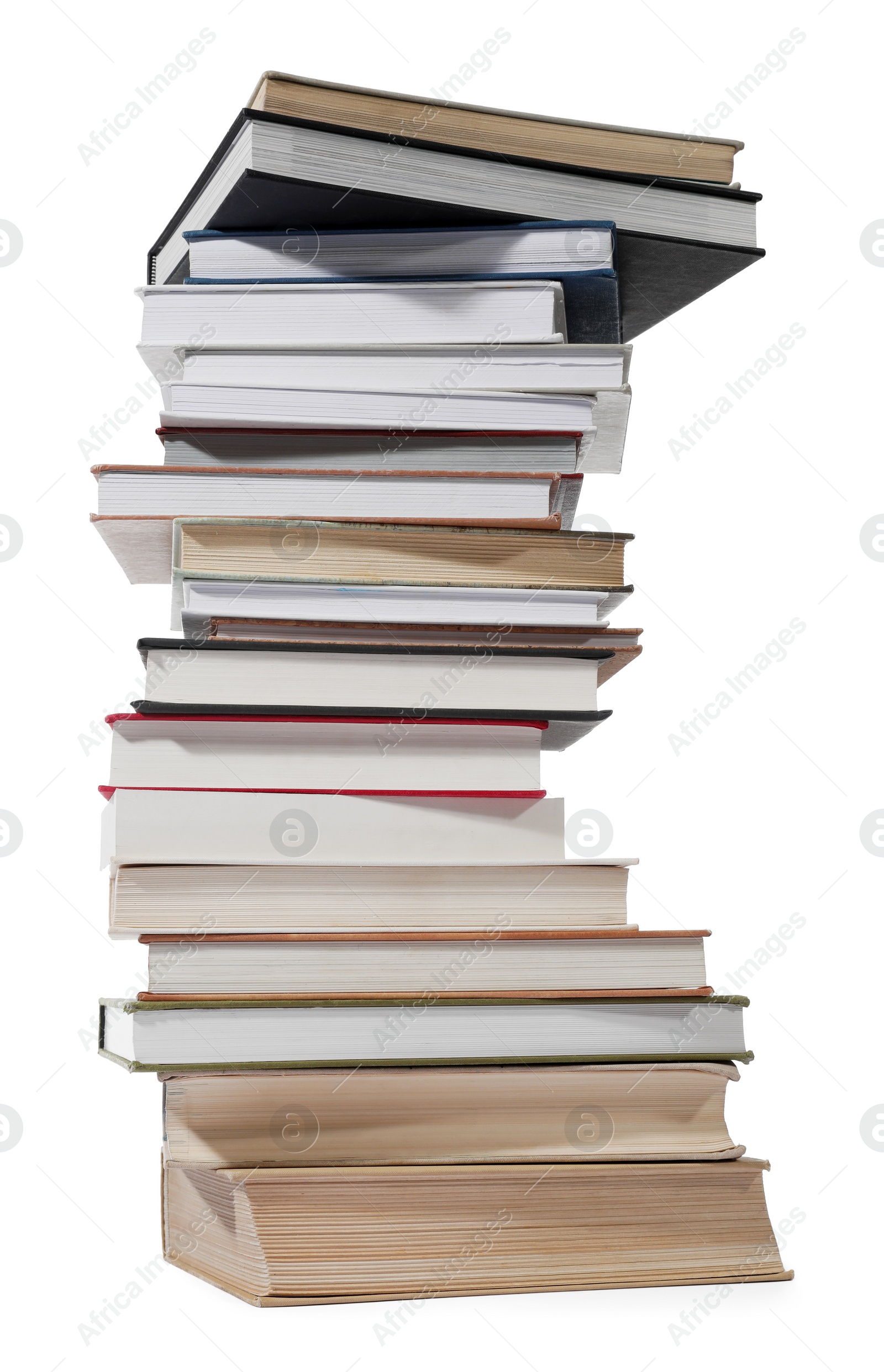 Photo of High stack of many different books isolated on white