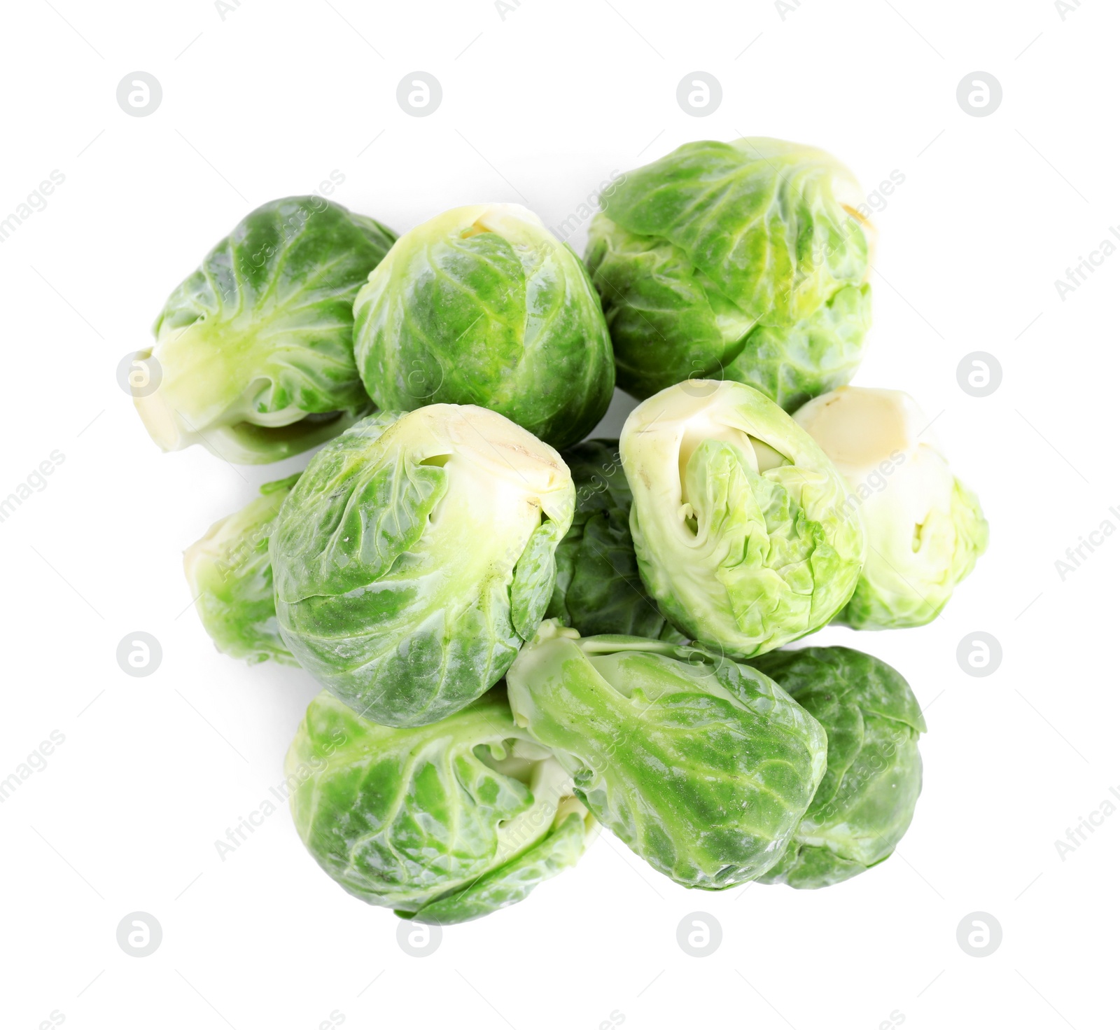 Photo of Pile of fresh Brussels sprouts isolated on white, top view