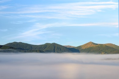 Photo of Picturesque view of fog in mountains on morning