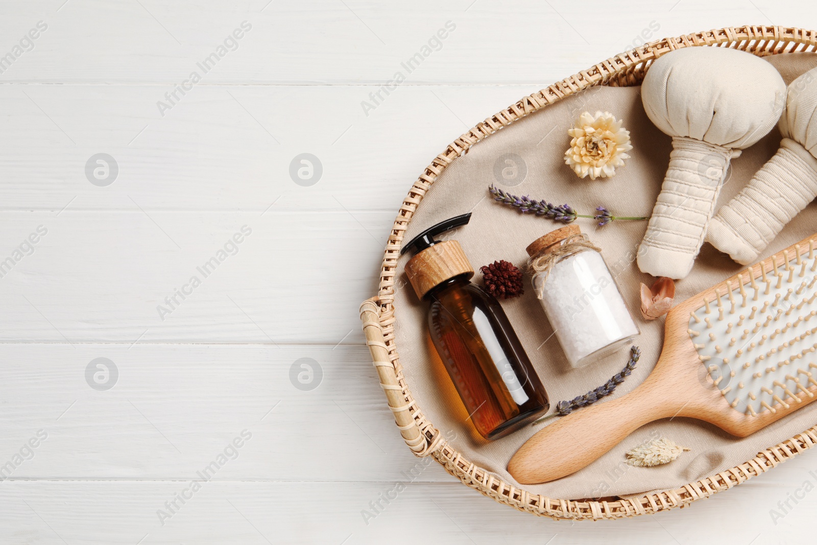 Photo of Spa gift set on white wooden table, top view. Space for text