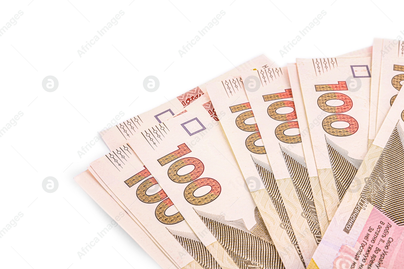 Photo of 100 Ukrainian Hryvnia banknotes on white background, closeup