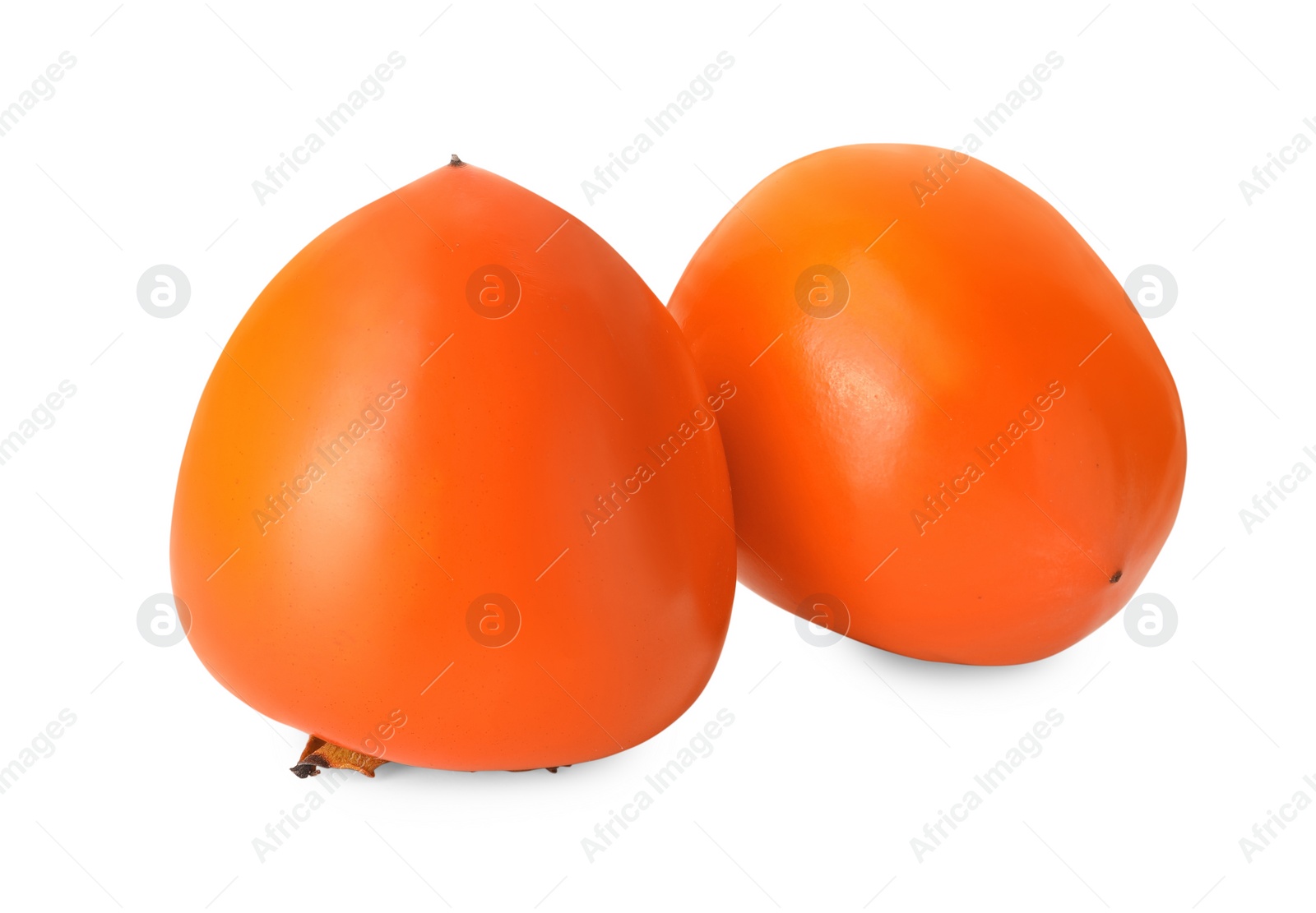 Photo of Delicious ripe juicy persimmons on white background