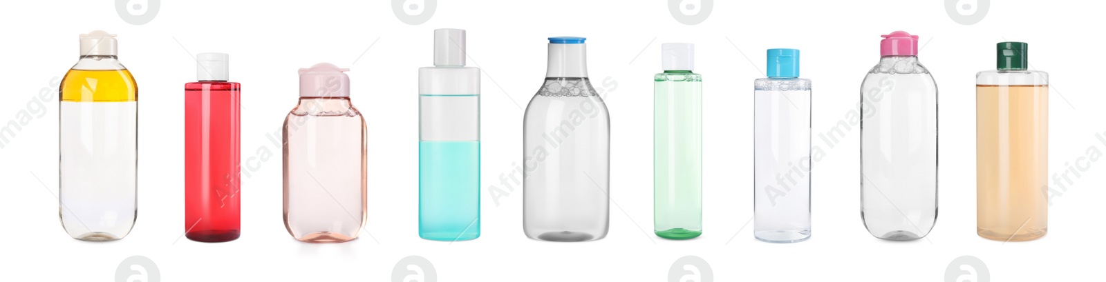 Image of Set with bottles of micellar cleansing water on white background