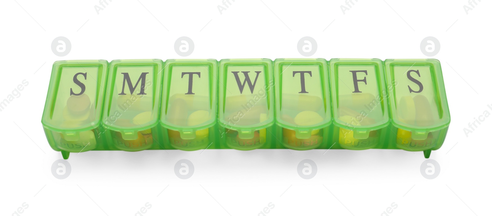 Photo of Different pills in organizer isolated on white