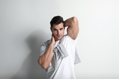 Portrait of handsome young man on white background