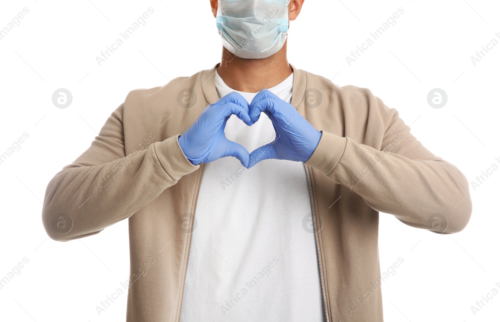 Photo of Man in protective face mask and medical gloves making heart with hands on white background, closeup