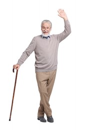 Photo of Senior man with walking cane waving on white background