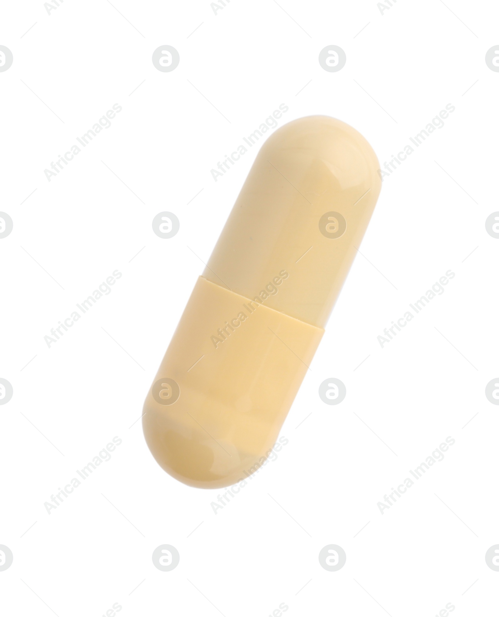 Photo of One vitamin capsule isolated on white, top view