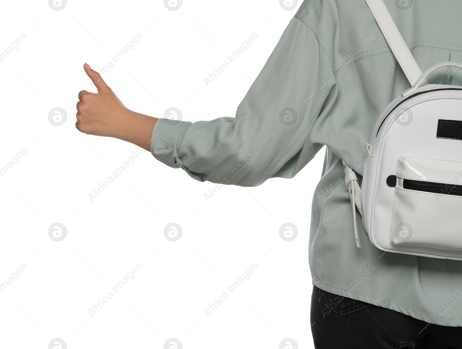 Photo of Woman with backpack hitchhiking on white background, closeup