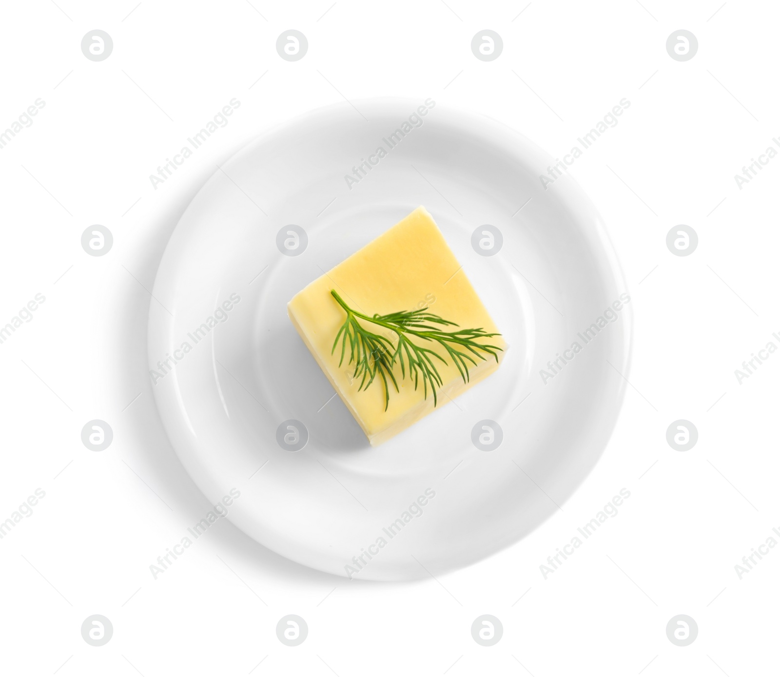 Photo of Plate with fresh butter isolated on white, top view