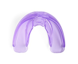 Photo of Transparent dental mouth guard isolated on white, top view. Bite correction